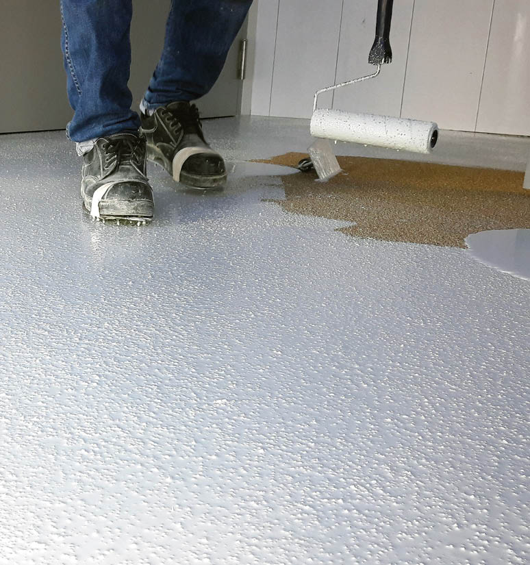 Epoxy floor surface preparetion cover with first white layer 