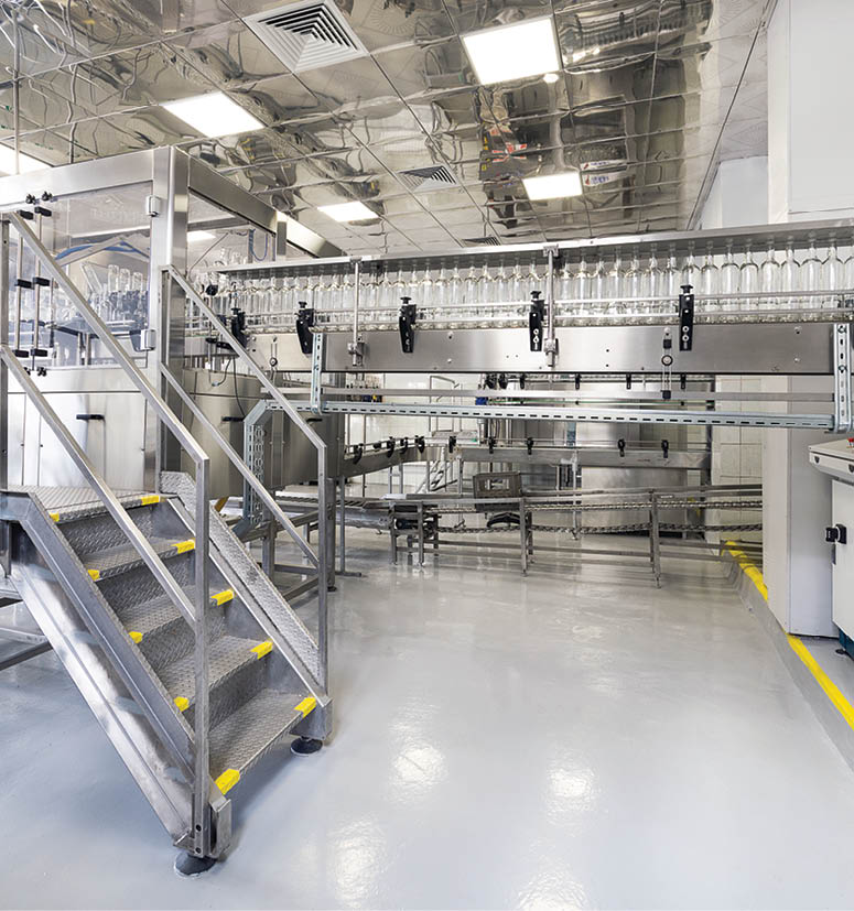 Factory for bottling alcoholic beverages. Abstract industrial background.