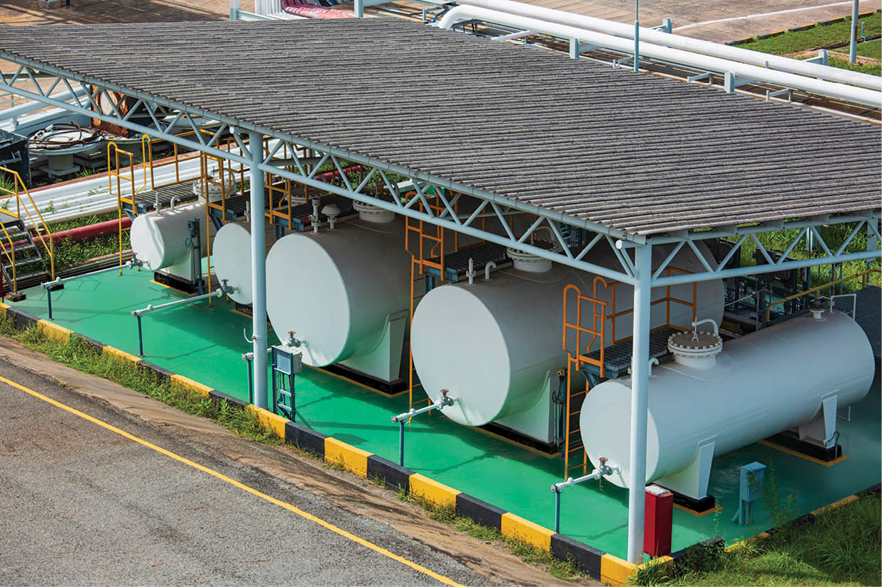 Storage tank whites of fuel oil in the horizontal tanks and pipeline.
