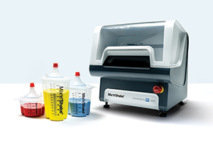 PPG Mix'n'Shake machine with containers of paint infront of the device.